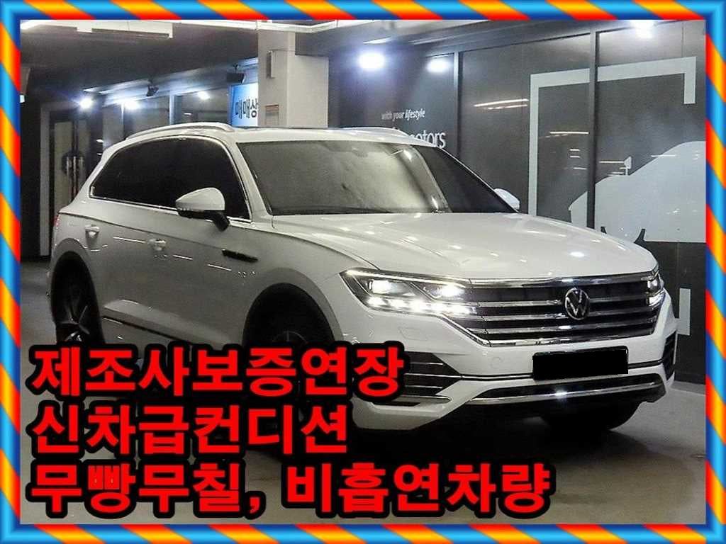 Volkswagen Touareg — photo 01