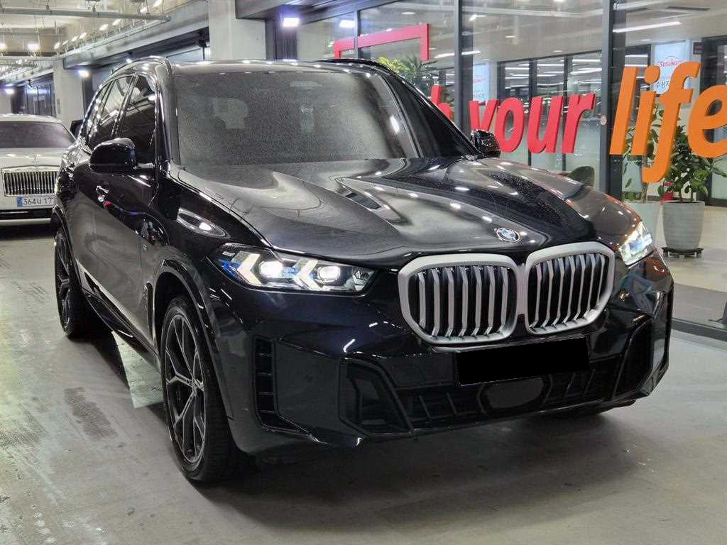 BMW X5 — photo 01