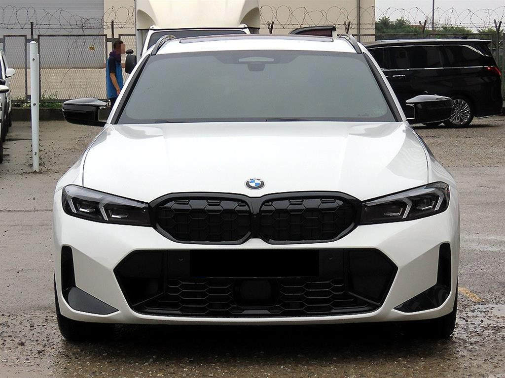 BMW 3-Series — photo 01