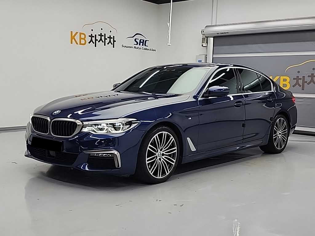 BMW 5-Series — photo 01