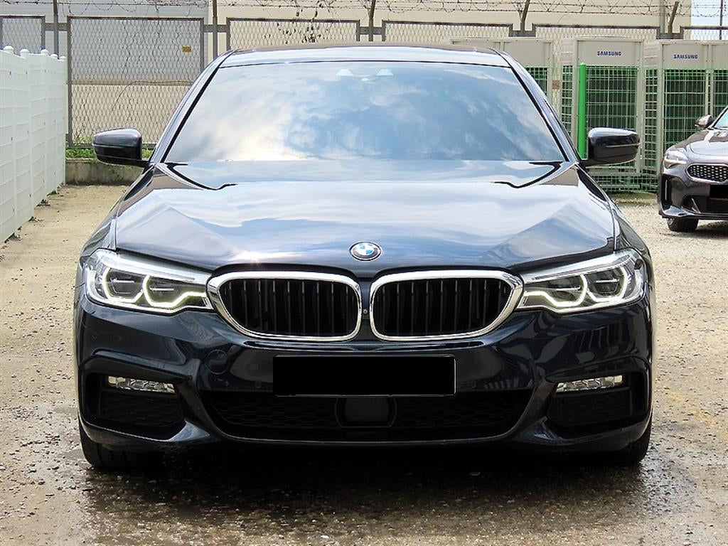 BMW 5-Series — photo 01