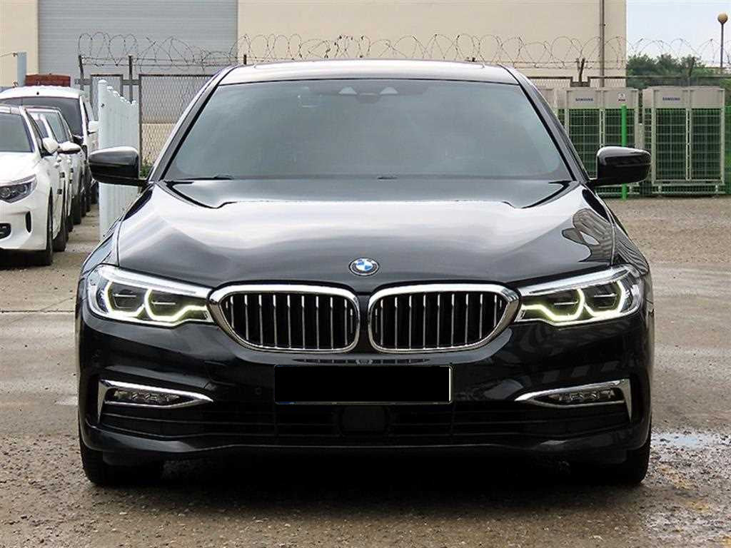 BMW 5-Series — photo 01