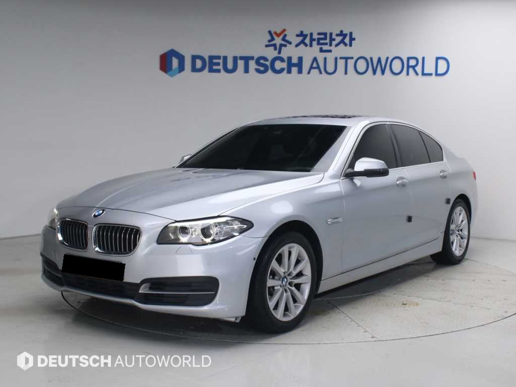 BMW 5-Series — photo 01