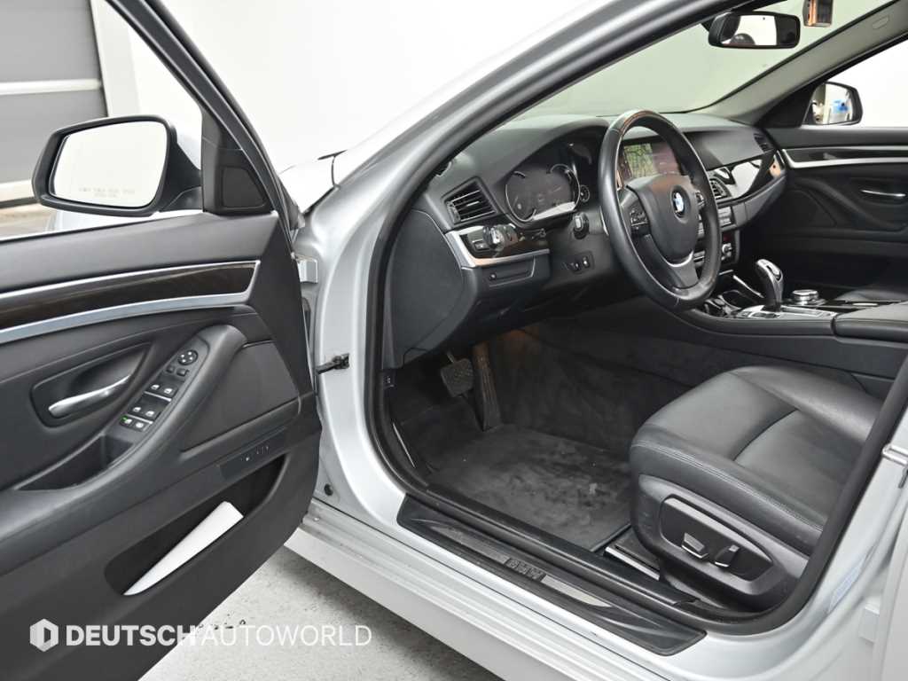 BMW 5-Series — photo 11