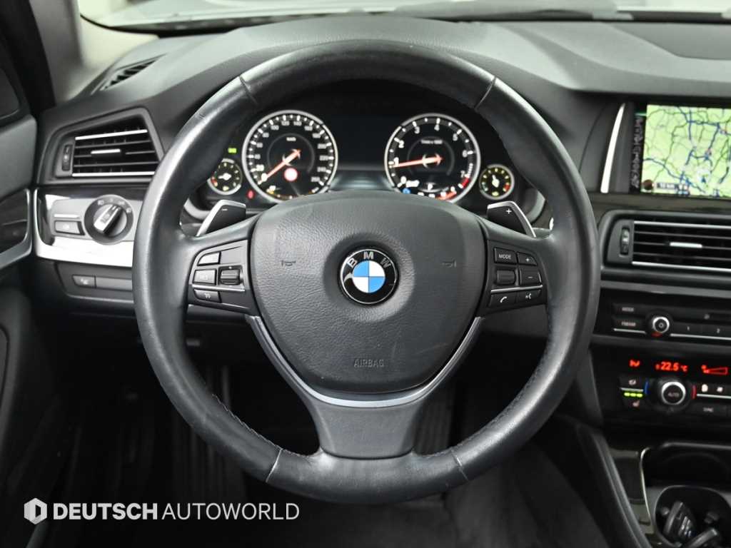 BMW 5-Series — photo 13