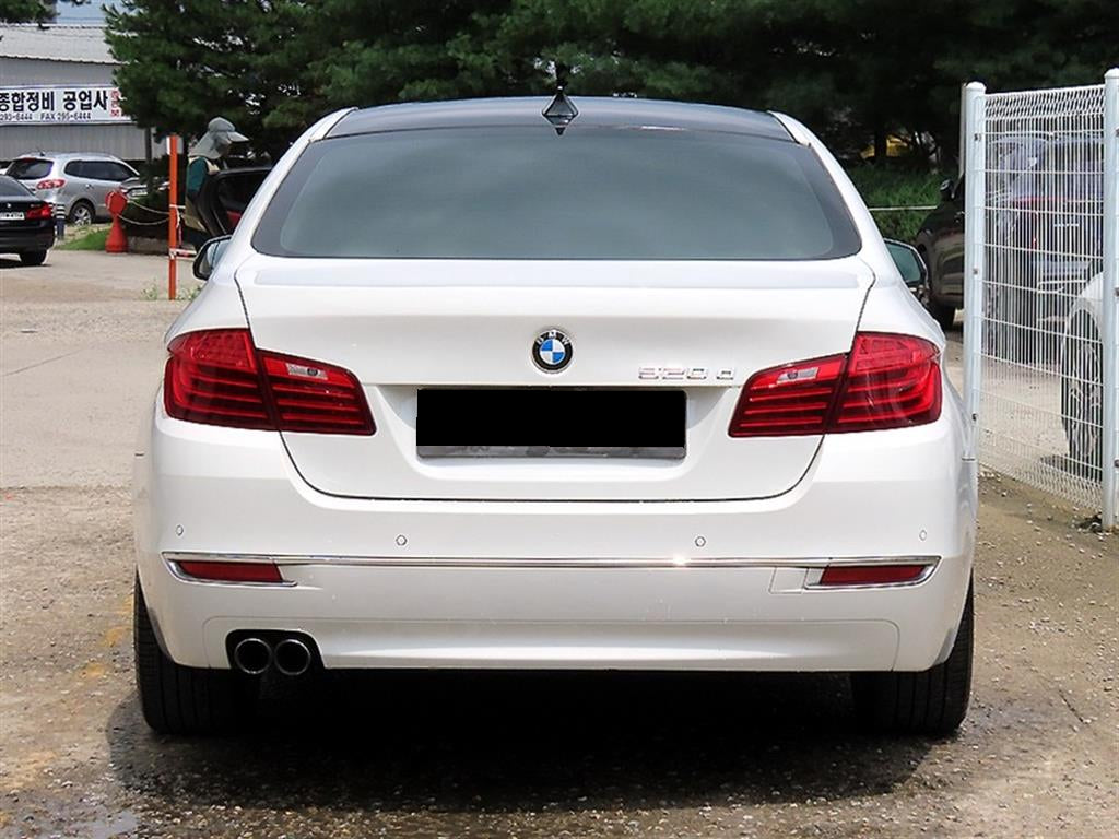 BMW 5-Series — photo 04