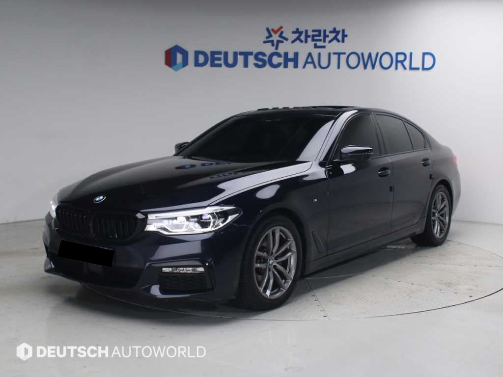BMW 5-Series — photo 01