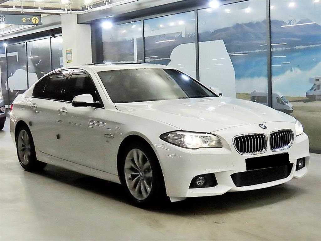 BMW 5-Series — photo 01