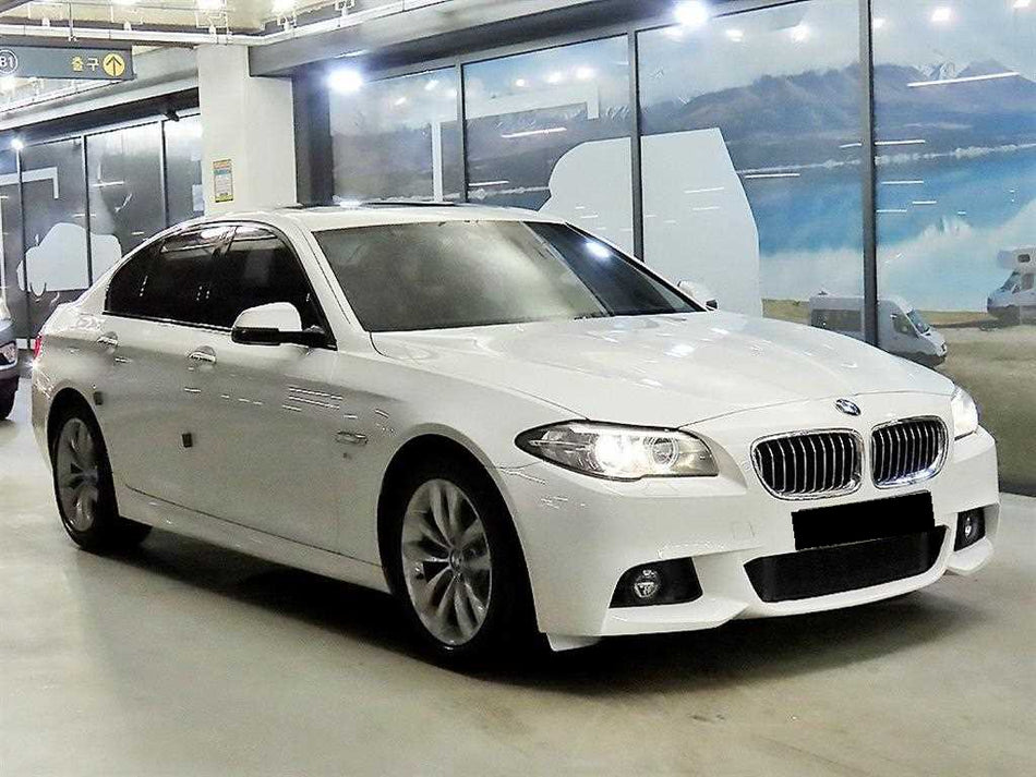 BMW 5-Series — photo 01