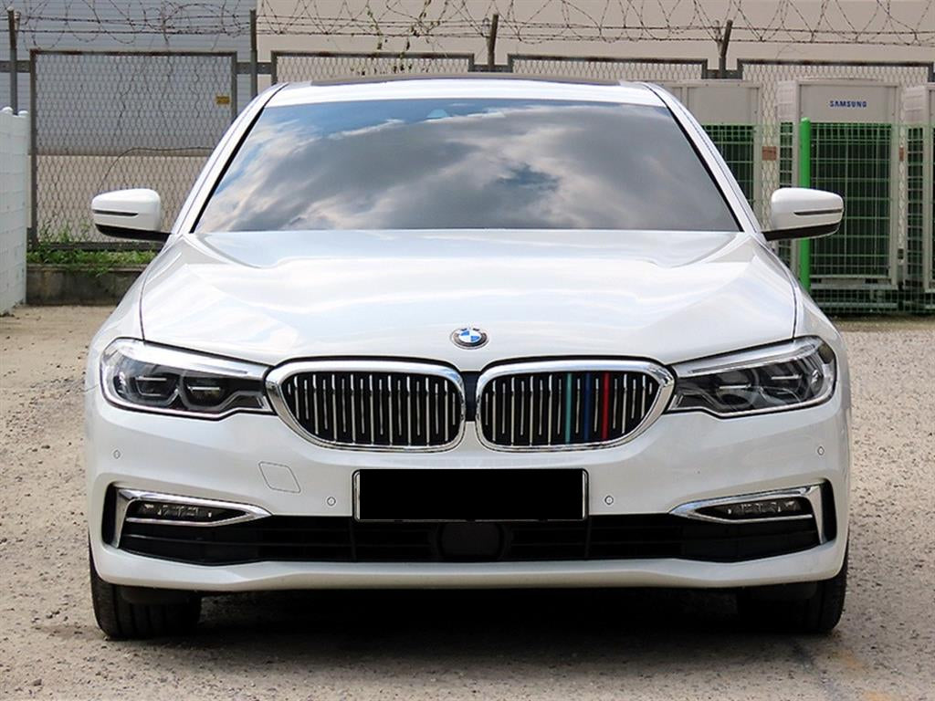 BMW 5-Series — photo 01