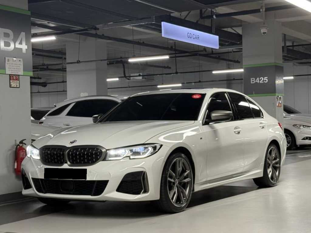 BMW 3-Series — photo 01