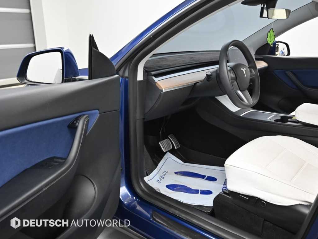 Tesla Model Y — photo 11
