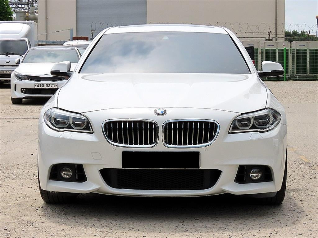 BMW 5-Series — photo 01