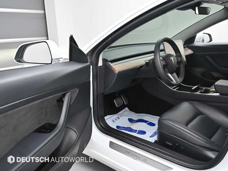 Tesla Model 3 — photo 11