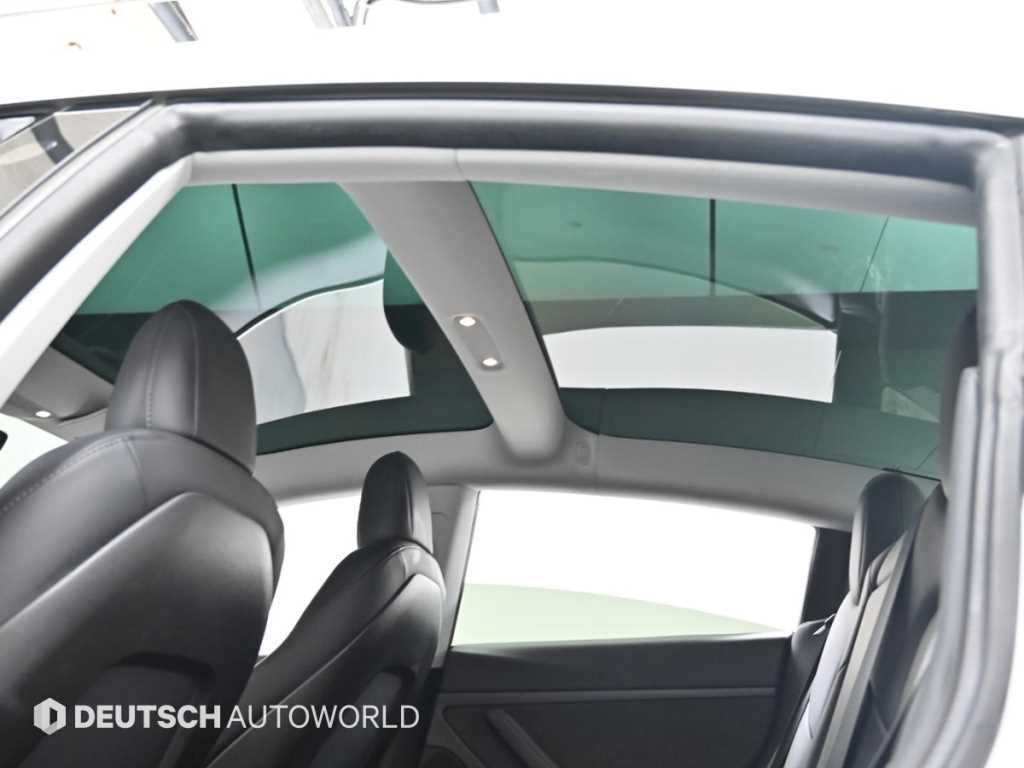 Tesla Model 3 — photo 18