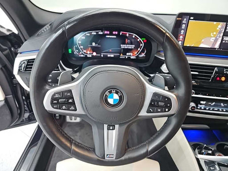 BMW 5-Series — photo 09