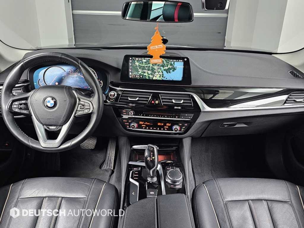BMW 5-Series — photo 07