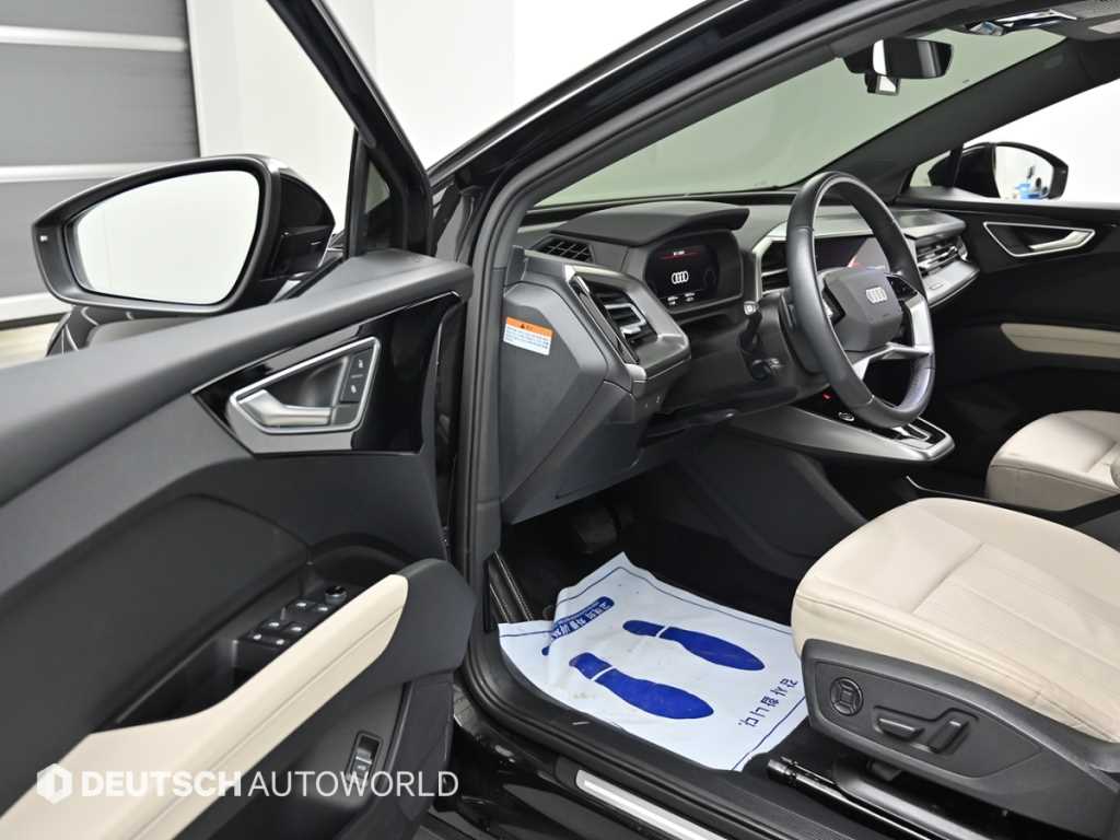 Audi Q4 e-tron — photo 11