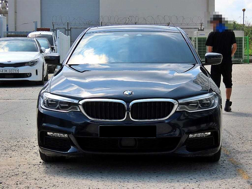 BMW 5-Series — photo 01
