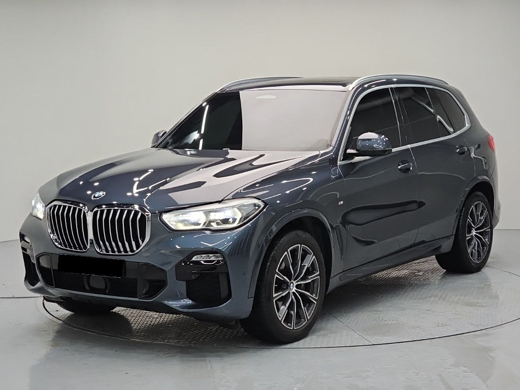 BMW X5 — photo 01