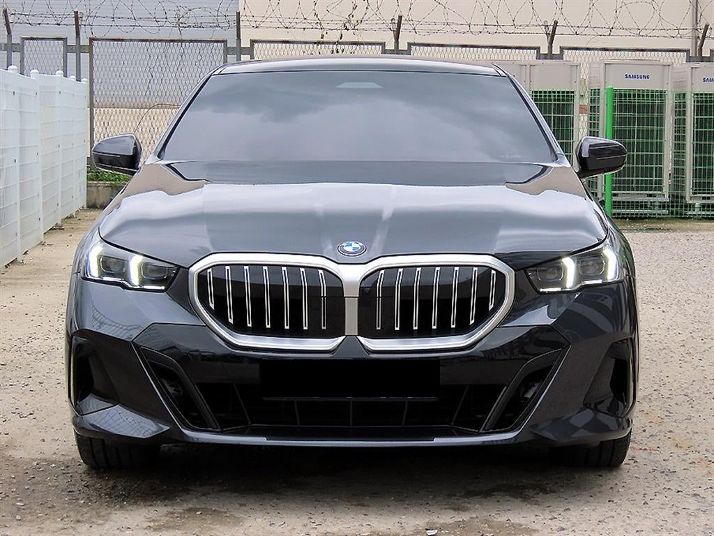 BMW 5-Series — photo 01