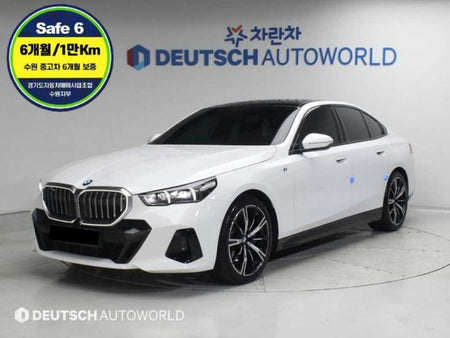 BMW 5-Series — photo 01