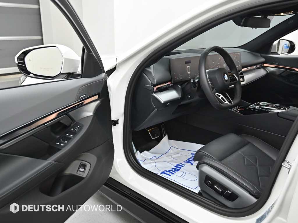 BMW 5-Series — photo 11