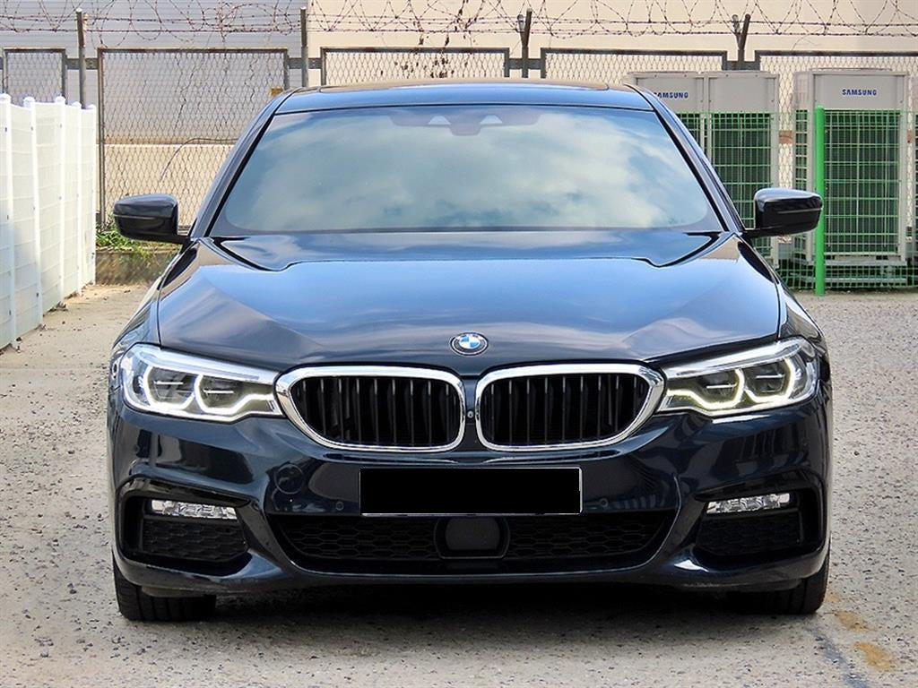 BMW 5-Series — photo 01