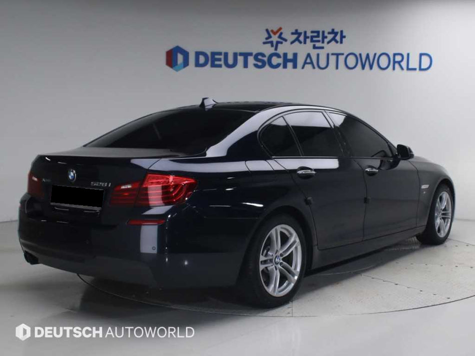 BMW 5-Series — photo 02