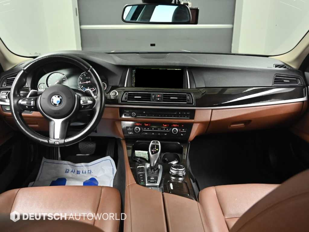 BMW 5-Series — photo 07