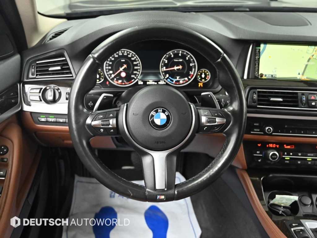 BMW 5-Series — photo 13