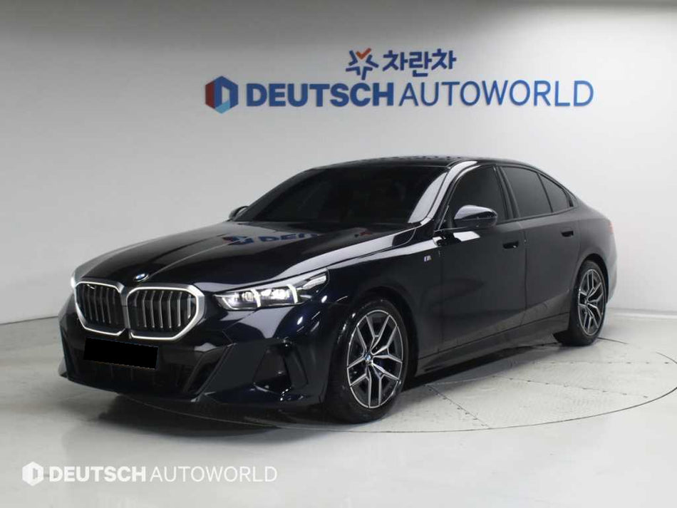 BMW 5-Series — photo 01