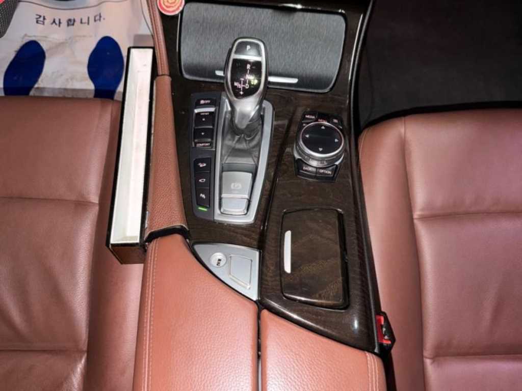 BMW 5-Series — photo 01