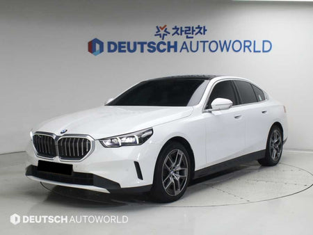 BMW 5-Series — photo 01