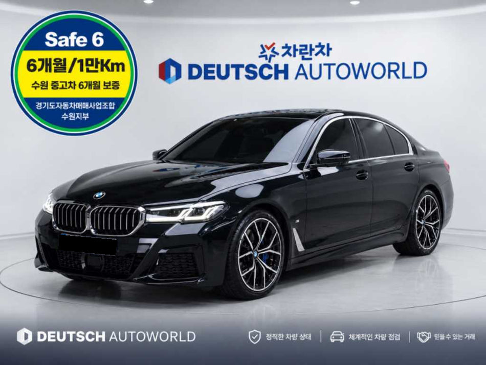 BMW 5-Series — photo 01