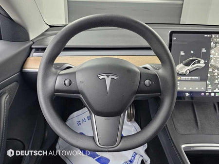 Tesla Model 3 — photo 13