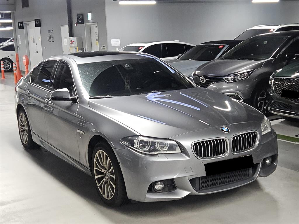 BMW 5-Series — photo 01
