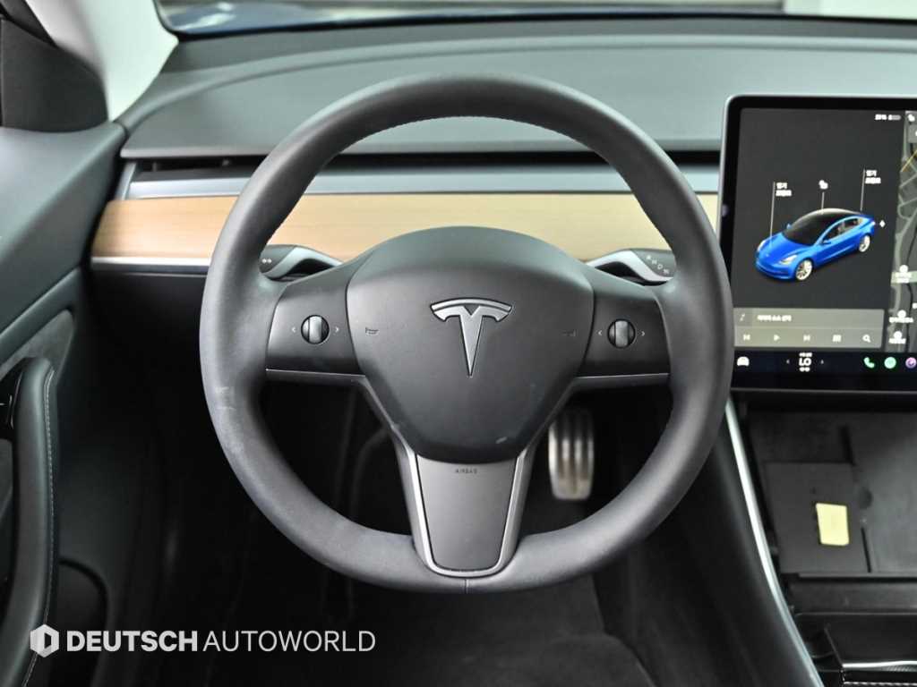 Tesla Model 3 — photo 13
