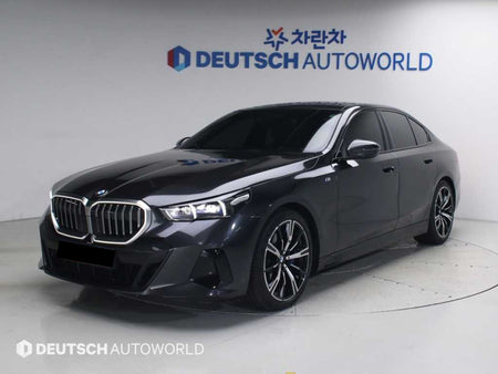 BMW 5-Series — photo 01
