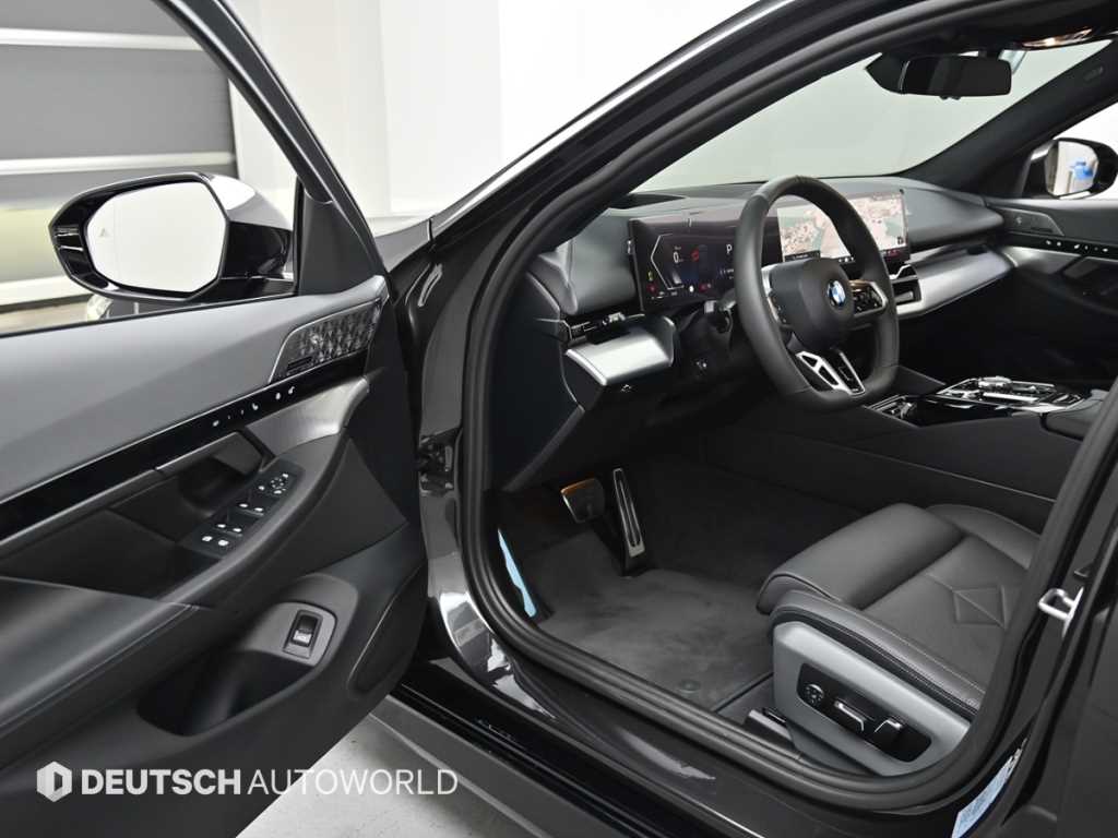 BMW 5-Series — photo 11