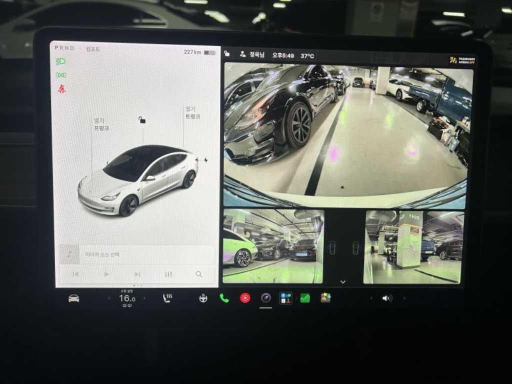 Tesla Model 3 — photo 12