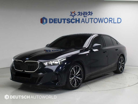 BMW 5-Series — photo 01