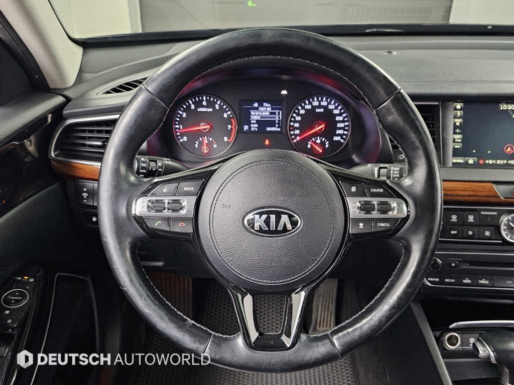 Kia K7 — photo 14