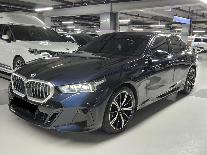 BMW 5-Series — photo 02