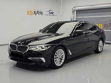 BMW 5-Series — photo 01