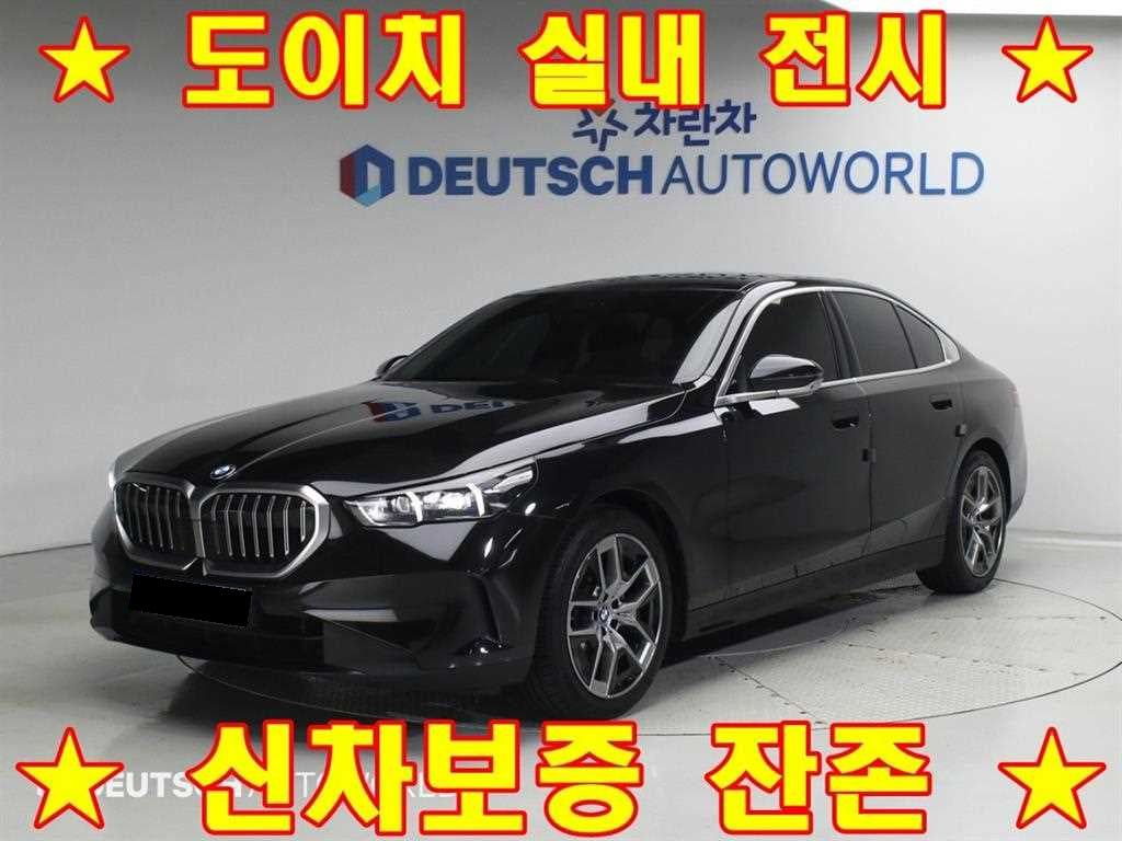 BMW 5-Series — photo 01