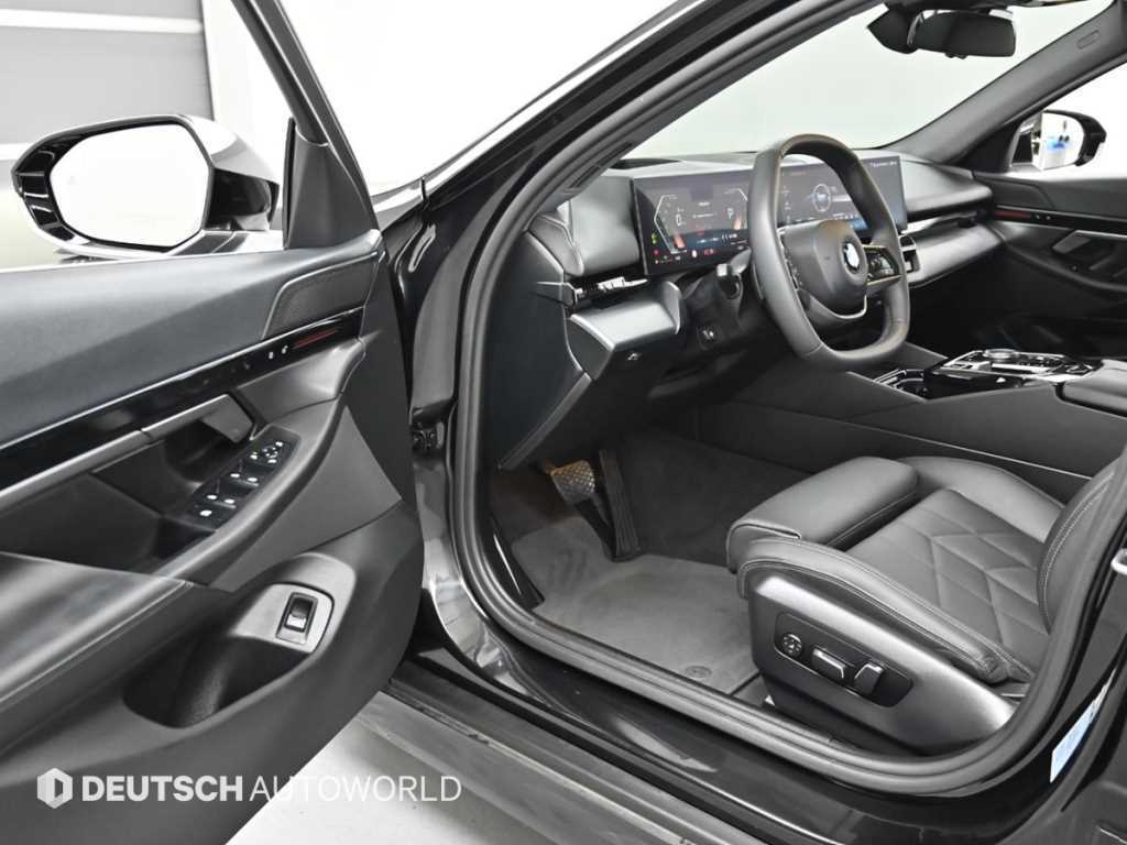 BMW 5-Series — photo 11