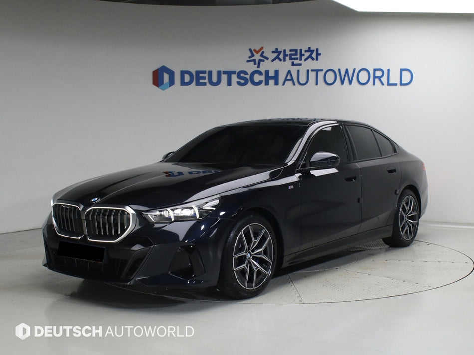 BMW 5-Series — photo 01