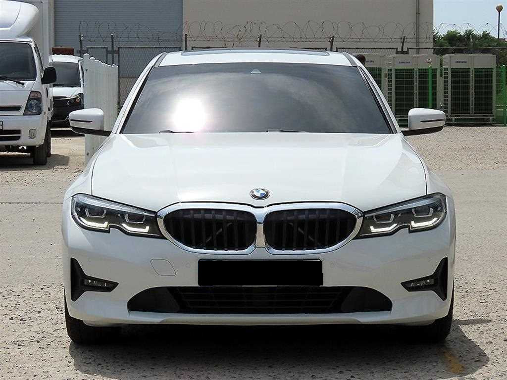BMW 3-Series — photo 01