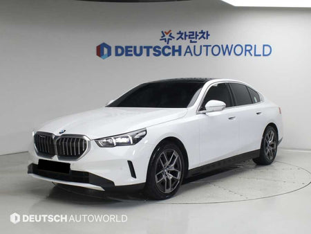 BMW 5-Series — photo 01